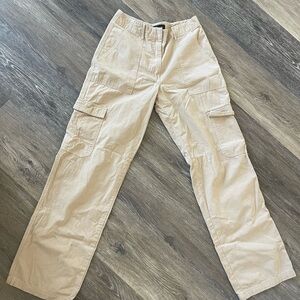 white fox beige cargos with some minor stains. XS